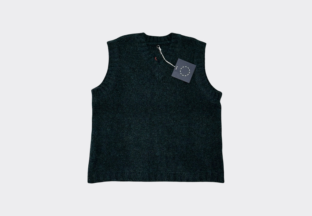 Dark blue grey sleeveless V Neck knit sweater vest on light grey background with navy swing tag