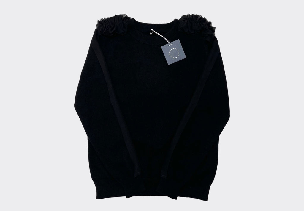 Front product shot round neck black cashmere Sphere One Capillary sweater with black ruffle chiffon shoulder and arm detail